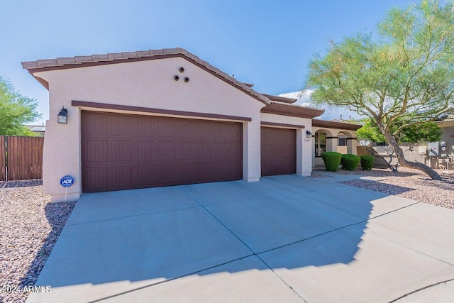 view of front of home with a garage