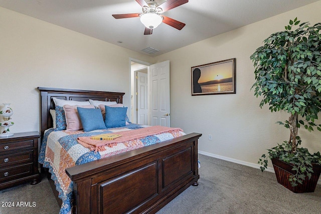 bedroom featuring ceiling fan and light carpet