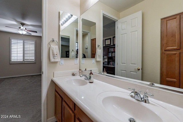 bathroom featuring vanity and ceiling fan