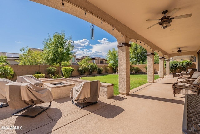 view of patio featuring ceiling fan