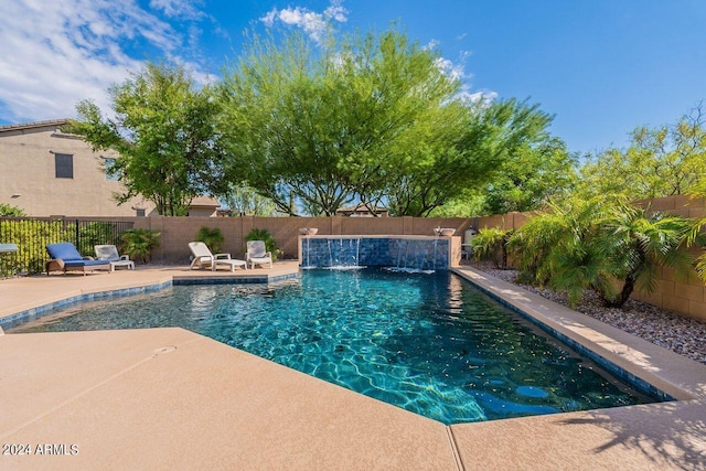 view of swimming pool featuring a patio area and pool water feature