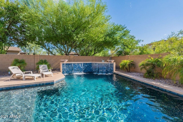 view of pool with pool water feature