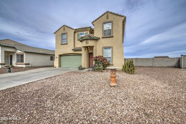 703 N Redwood Ln, Buckeye, AZ 85326 - mediterranean / spanish house featuring stucco siding, a tiled roof, driveway, and a garage