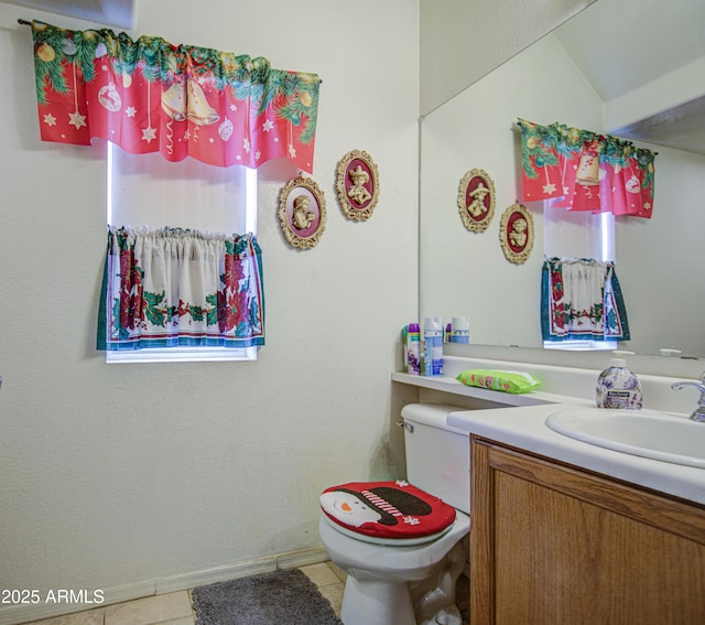 703 N Redwood Ln, Buckeye, AZ 85326 - bathroom with vanity, toilet, and tile patterned floors