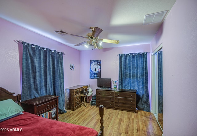 703 N Redwood Ln, Buckeye, AZ 85326 - bedroom with wood finished floors and ceiling fan
