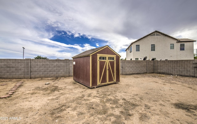 703 N Redwood Ln, Buckeye, AZ 85326 - view of shed with a fenced backyard