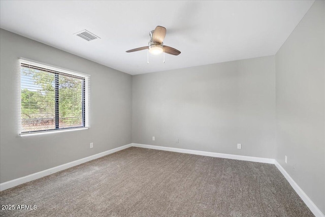 3540 S Cottonwood Dr, Camp Verde, AZ 86322 - unfurnished room with carpet floors, baseboards, and a ceiling fan