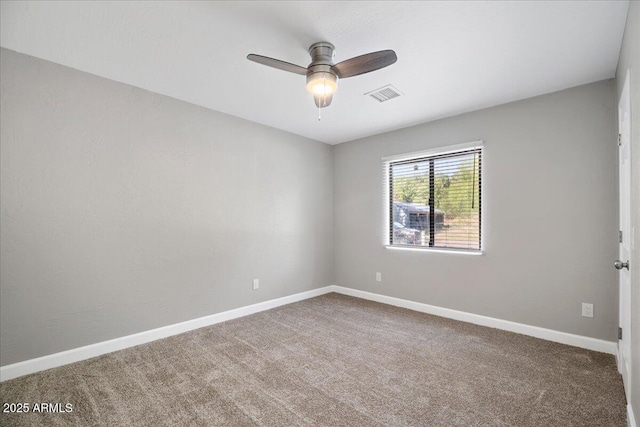 3540 S Cottonwood Dr, Camp Verde, AZ 86322 - empty room featuring a ceiling fan, baseboards, and carpet flooring