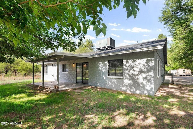 3540 S Cottonwood Dr, Camp Verde, AZ 86322 - back of property with a patio, central air condition unit, a gate, and stucco siding