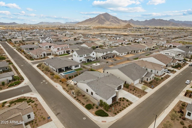 drone / aerial view featuring a mountain view