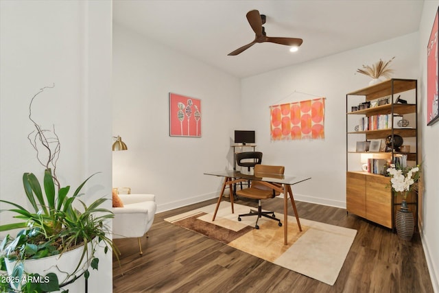 office area featuring ceiling fan and dark hardwood / wood-style floors