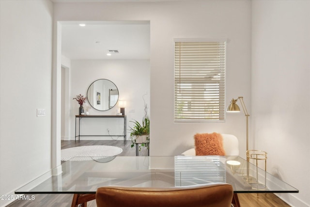 dining room with hardwood / wood-style floors