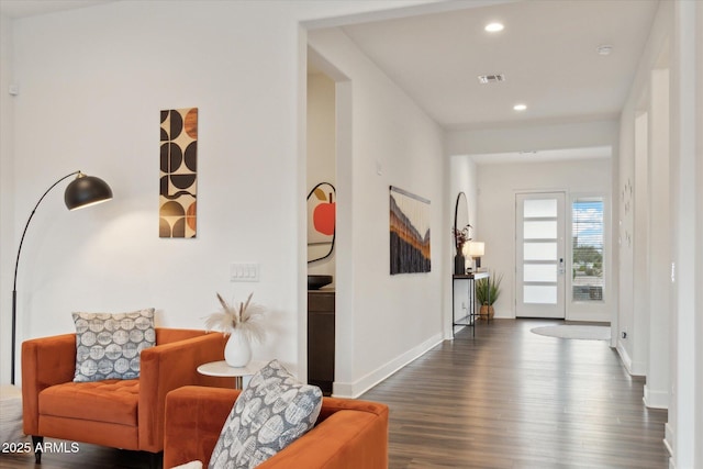 foyer entrance with dark hardwood / wood-style flooring