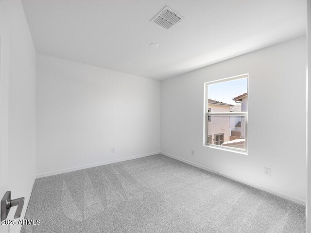 14634 W Sand Hills Rd, Surprise, AZ 85387 - carpeted spare room with baseboards