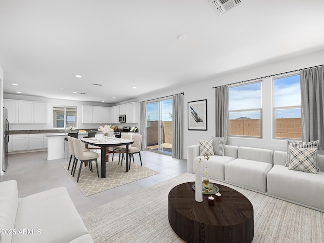 14634 W Sand Hills Rd, Surprise, AZ 85387 - living area featuring light tile patterned floors and recessed lighting