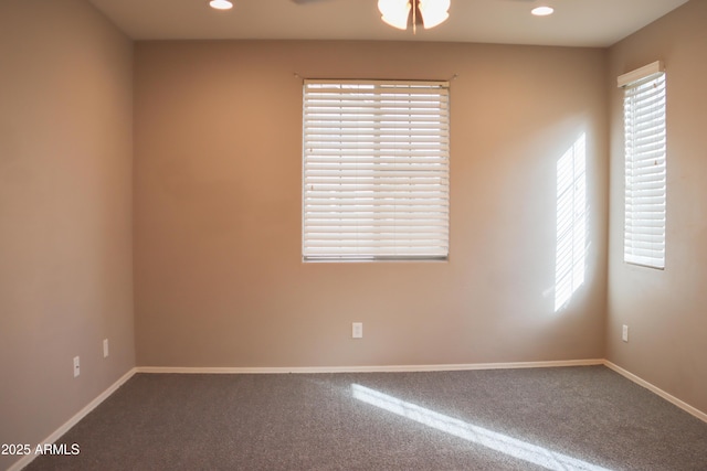 carpeted empty room with recessed lighting and baseboards