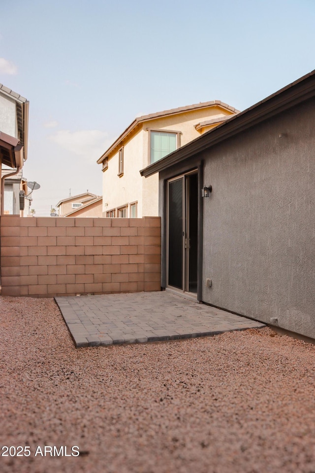 view of yard featuring a patio area and fence