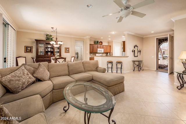 living room with light tile floors, crown molding, and ceiling fan with notable chandelier