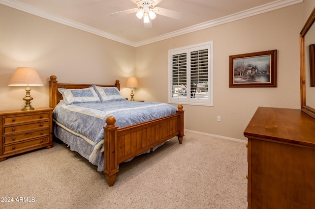 bedroom featuring light colored carpet, ceiling fan, and crown molding