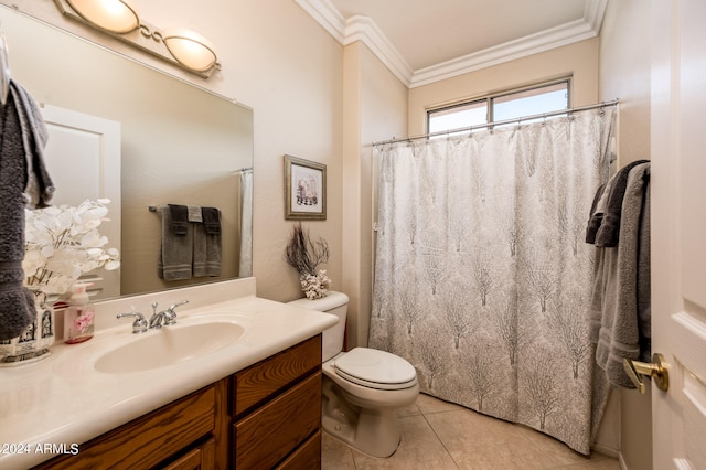 bathroom with crown molding, tile flooring, toilet, and vanity