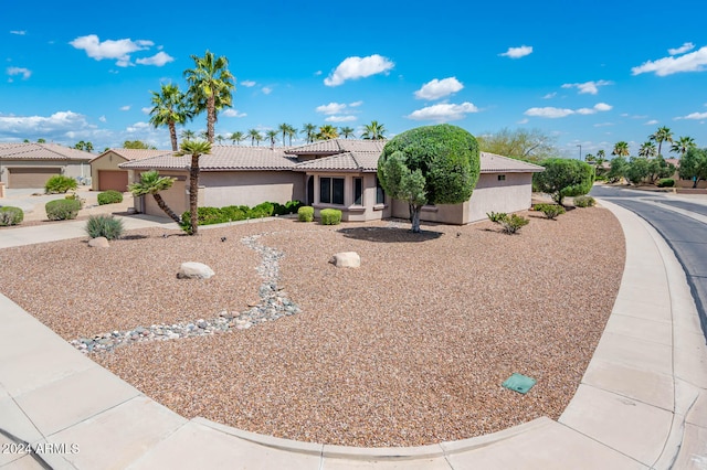 view of front of property with a garage