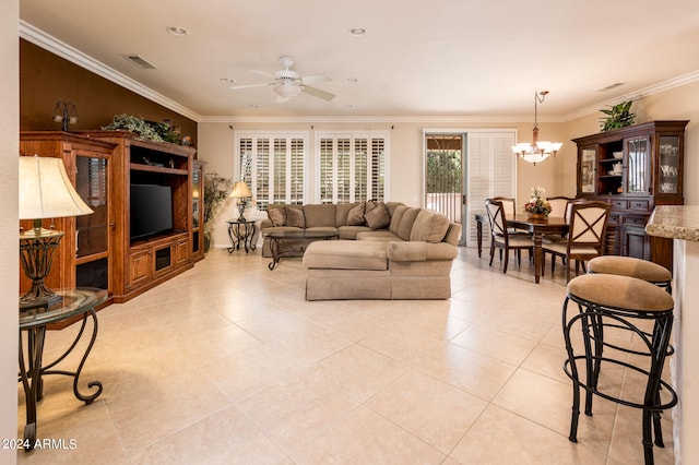 tiled living room featuring ornamental molding and ceiling fan with notable chandelier