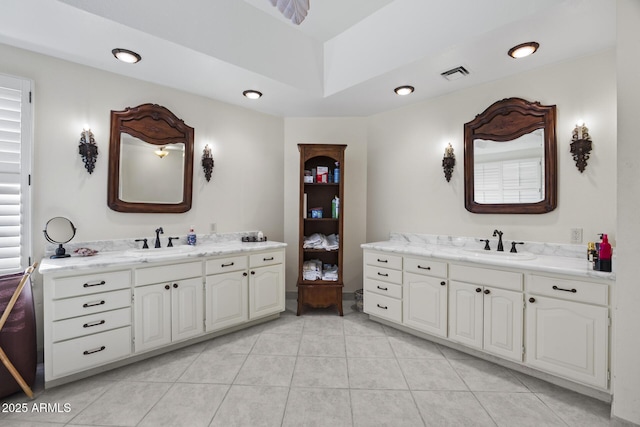 bathroom with vanity and tile patterned floors