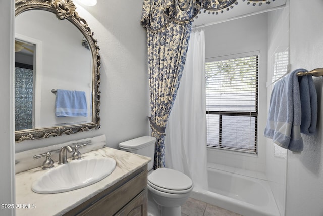 full bathroom with vanity, shower / bath combo, tile patterned floors, and toilet