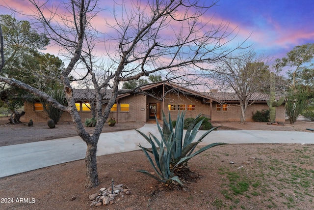 view of front of home with a patio