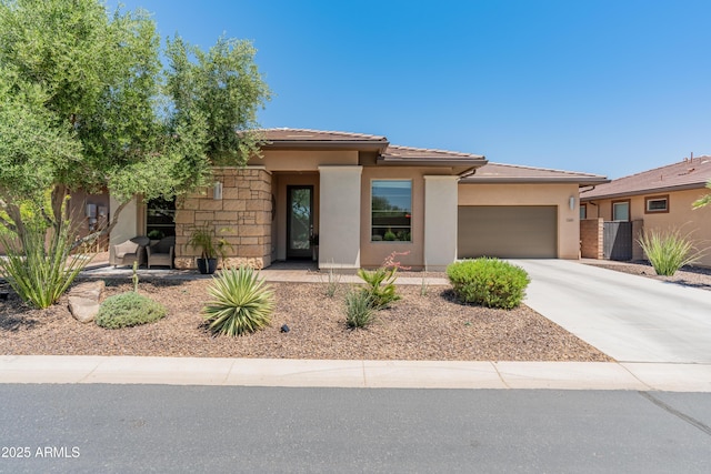 13186 W Via Dona Rd, Peoria, AZ 85383 - view of front of property featuring an attached garage, stucco siding, concrete driveway, and a tile roof
