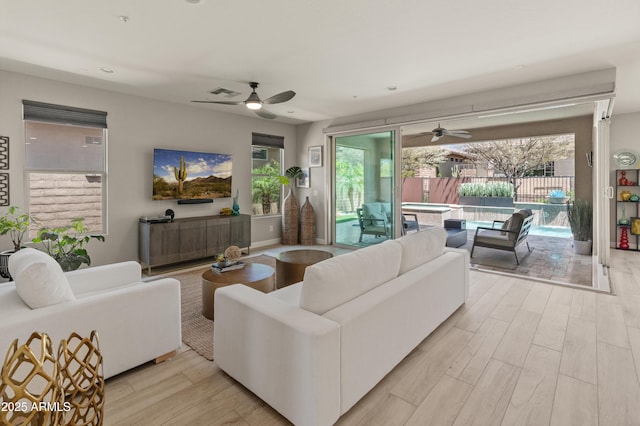 13186 W Via Dona Rd, Peoria, AZ 85383 - living room with ceiling fan and wood finished floors