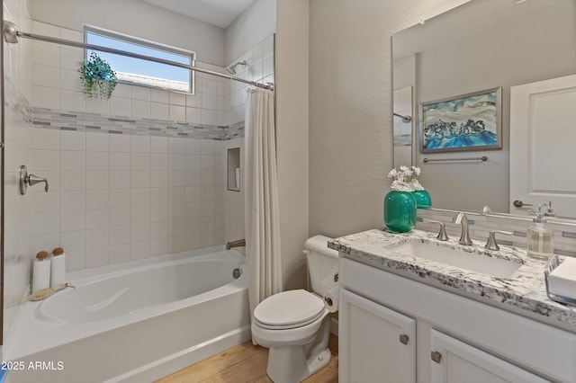 13186 W Via Dona Rd, Peoria, AZ 85383 - full bathroom with vanity, shower / bath combo, wood finished floors, and toilet