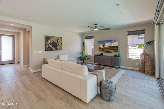 13186 W Via Dona Rd, Peoria, AZ 85383 - living area featuring light wood-style floors, recessed lighting, ceiling fan, and baseboards