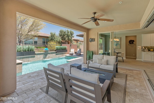 13186 W Via Dona Rd, Peoria, AZ 85383 - fenced backyard featuring ceiling fan, an outdoor living space, and a patio area