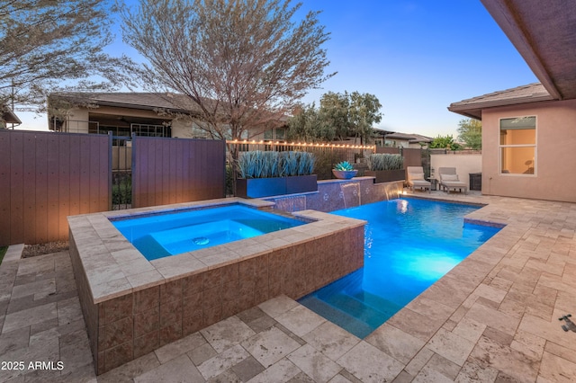 13186 W Via Dona Rd, Peoria, AZ 85383 - view of pool with an in-ground hot tub, a patio, and a fenced backyard