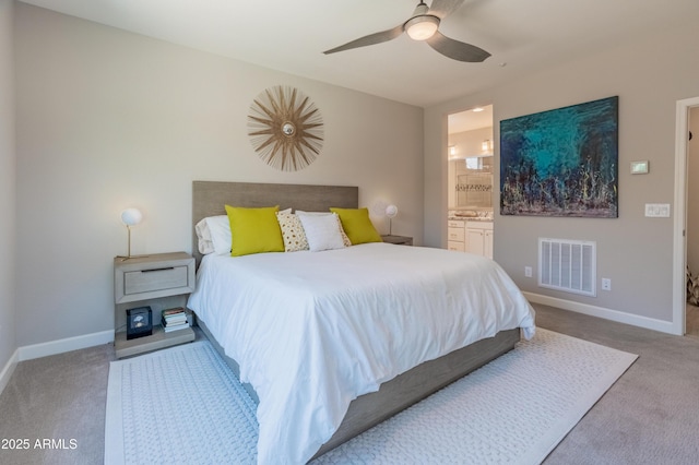 13186 W Via Dona Rd, Peoria, AZ 85383 - carpeted bedroom featuring baseboards, ensuite bath, and ceiling fan