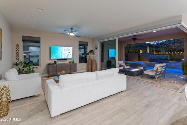 13186 W Via Dona Rd, Peoria, AZ 85383 - living room featuring ceiling fan and wood finished floors