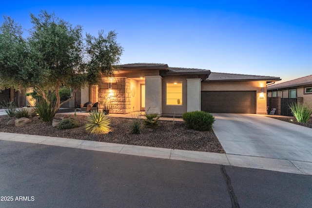 13186 W Via Dona Rd, Peoria, AZ 85383 - prairie-style home with driveway, a garage, stucco siding, and a tile roof