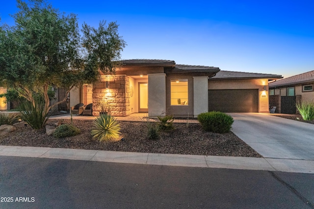 13186 W Via Dona Rd, Peoria, AZ 85383 - prairie-style home featuring driveway, a garage, a tiled roof, and stucco siding