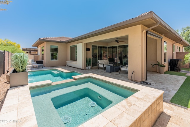 13186 W Via Dona Rd, Peoria, AZ 85383 - view of pool with a patio, a fenced backyard, ceiling fan, and a pool with connected hot tub