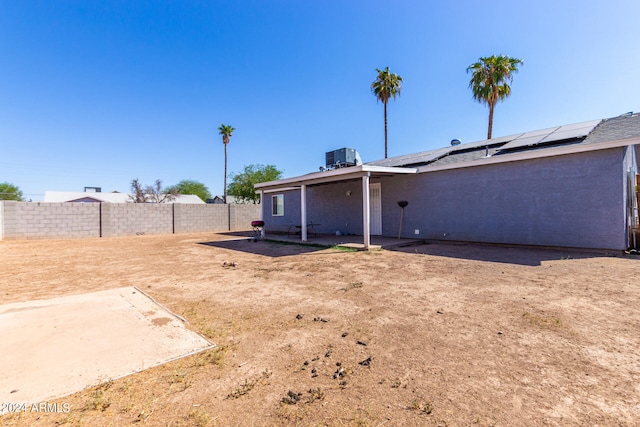 view of yard featuring cooling unit and a patio area