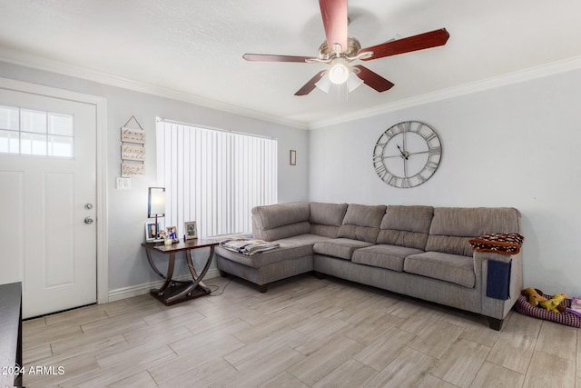 living room with ceiling fan, crown molding, and light hardwood / wood-style floors