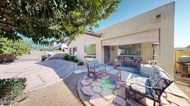 view of patio / terrace featuring a grill and outdoor lounge area