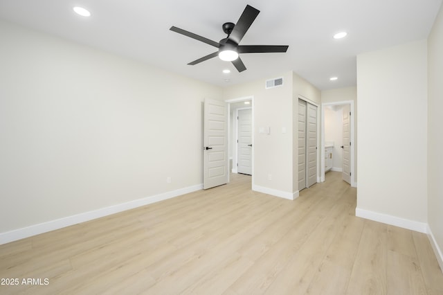 8341 E Keim Dr, Scottsdale, AZ 85250 - unfurnished bedroom featuring light wood-type flooring, recessed lighting, a ceiling fan, and a closet