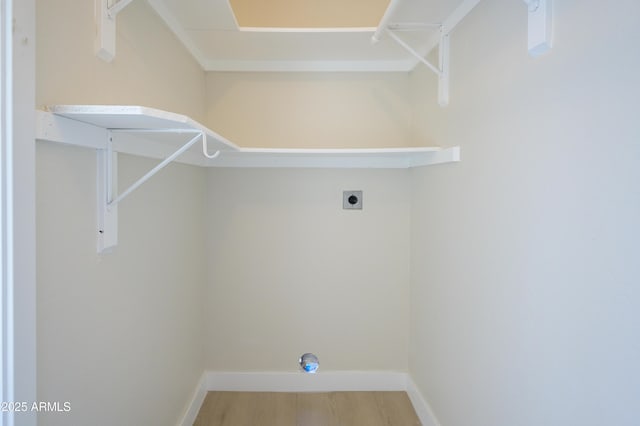 8341 E Keim Dr, Scottsdale, AZ 85250 - laundry room featuring light wood-type flooring and electric dryer hookup