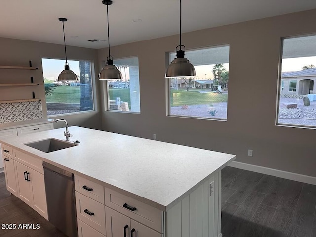 2734 N Trevino Pl, Mesa, AZ 85215 - kitchen featuring dishwasher, light countertops, dark wood-style flooring, and a sink