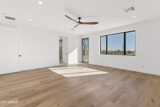 interior space featuring ceiling fan and light hardwood / wood-style flooring