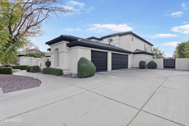 view of side of property with a garage