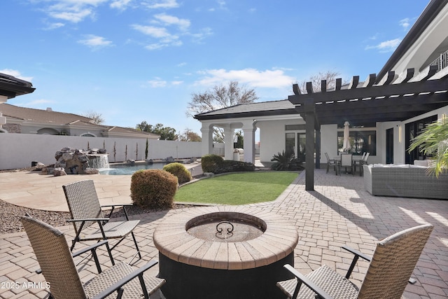 view of patio / terrace featuring a pergola, pool water feature, a fenced in pool, and an outdoor fire pit