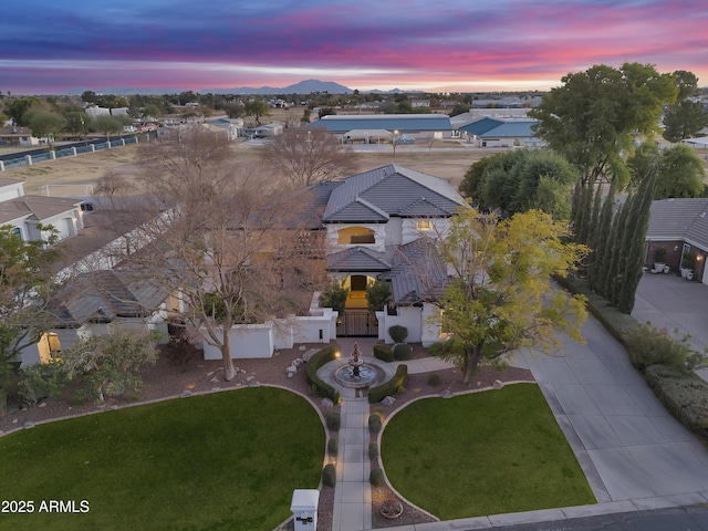 view of aerial view at dusk